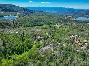 Bird's eye view with a water and mountain view