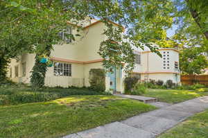 View of front of home featuring a front lawn