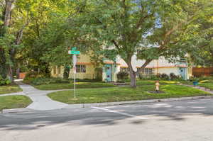 View of front of house featuring a front lawn