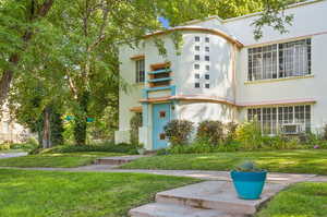 View of front of house with a front yard