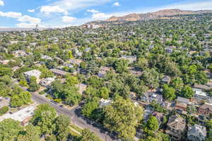 Birds eye view of property with a mountain view