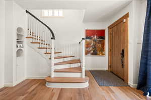 Foyer featuring hard wood flooring