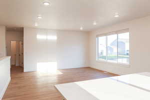 Great room with light wood-type flooring