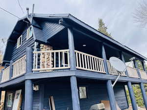 View of property exterior with a balcony