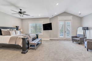 Bedroom featuring carpet flooring, access to outside, vaulted ceiling, and ceiling fan