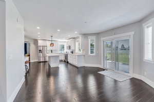 Living room featuring dark hardwood / wood-style floors