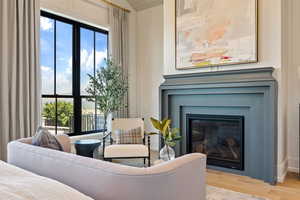 Living room featuring plenty of natural light and light hardwood / wood-style floors