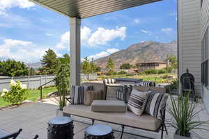 View of patio featuring a mountain view