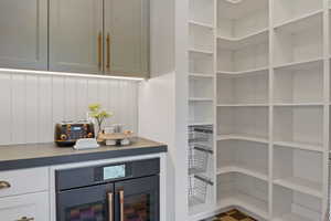 Pantry featuring beverage cooler