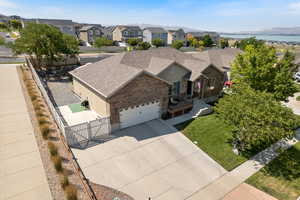 Birds eye view of property front and side