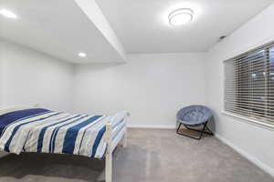 Bedroom featuring carpet floors