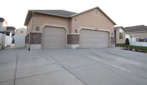 Rambler Ranch Home With Expansive Driveway, 3 Car Garage and RV Parking