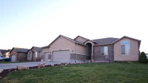 Rambler Ranch Home With Expansive Driveway