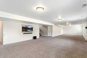 Basement featuring carpet floors