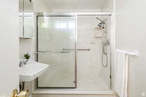 Bathroom featuring an enclosed shower