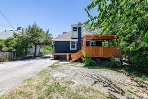 View of front of property with a deck