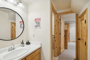 Bathroom with vanity and tile patterned flooring