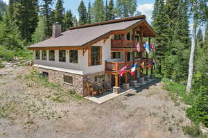 View of front of home featuring a balcony