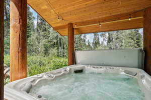 Exterior space featuring a hot tub