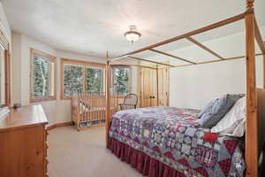 Bedroom featuring carpet floors