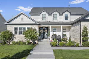 View of front of house featuring a front lawn