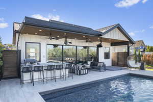 Pool House, hot tub, and outdoor kitchen