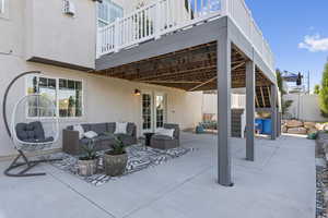 View of patio with a deck and outdoor lounge area