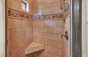 Bathroom with tiled shower