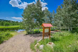 View of home's community featuring a water view