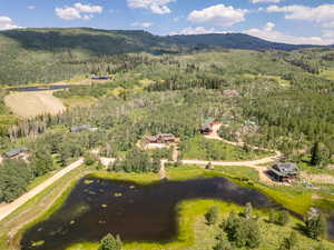 Birds eye view of property featuring a mountain view