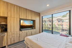 Bedroom featuring dark hardwood / wood-style flooring