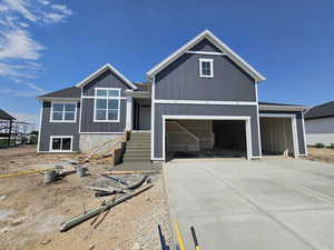 View of front of property featuring a garage