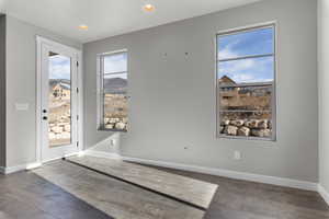 Interior space with hardwood / wood-style floors