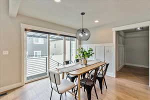 Dining area featuring light wood-type flooring