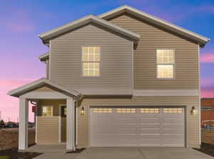 View of front of house featuring a garage