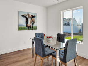 Dining area featuring light hardwood / wood-style floors