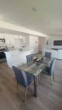 Dining area featuring wood-type flooring