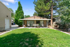 View of yard featuring a patio and an outdoor hangout area