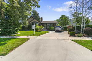 View of front facade with a front yard