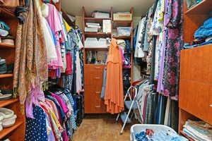 Spacious closet featuring tile patterned flooring