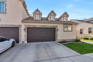 View of front of home featuring a garage