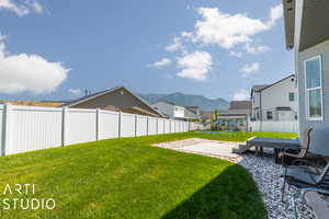 View of yard with a mountain view