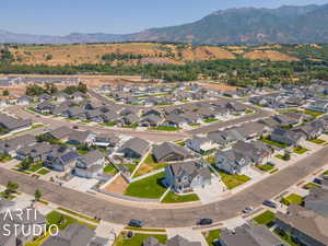 Birds eye view of property with a mountain view