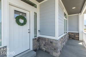 Property entrance featuring a porch