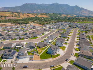 Birds eye view of property with a mountain view