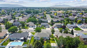 Birds eye view of property featuring a mountain view