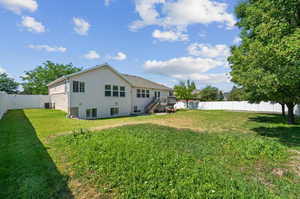 View of yard featuring central AC unit