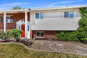 View of front of property featuring a patio