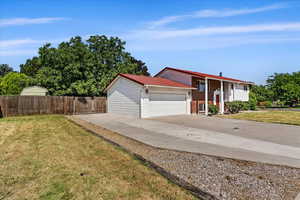 View of front of property with a front lawn