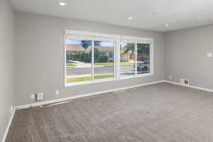 View of carpeted spare room